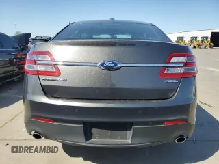 2015 Ford Taurus SEL z VIN 1FAHP2E86FG203425, wystawiony jako Copart lot #52261295 z przebiegiem 78 575 mil mil oraz Szkoda całkowita • Salvage title. Historia ofert i sprzedaży dostępna na DreamBid. Obrazek 6.