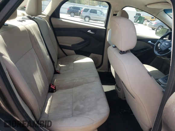 2016 Ford Focus SE z VIN 1FADP3F23GL355587, wystawiony jako Copart lot #53462345 z przebiegiem 101 628 mil mil oraz Szkoda całkowita • Salvage title. Historia ofert i sprzedaży dostępna na DreamBid. Obrazek 10.
