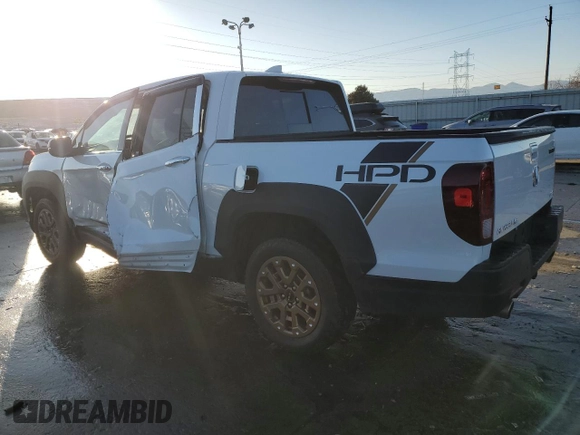 2021 Honda Ridgeline RTL-E with VIN 5FPYK3F74MB019684, listed as a Copart auction lot 42140235 with 31,223 mi miles and Salvage title. Bid and sale history available at DreamBid. Image 2.