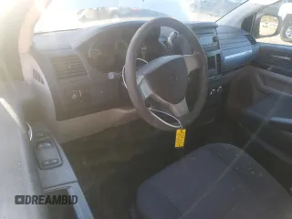 2009 Dodge Grand Caravan Cargo with VIN 2D4HN11E09R685028, listed as a Copart auction lot 77095054 with 240,140 mi miles and Salvage Title. Bid and sale history available at carsss.com. Image 8.