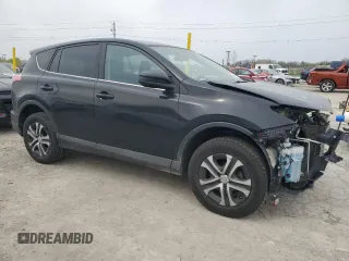 2018 Toyota RAV4 LE with VIN 2T3BFREV9JW709829, listed as a Copart auction lot 52767045 with 137,988 mi miles and Salvage Title. Bid and sale history available at DreamBid. Image 4.