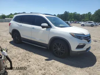 2017 Honda Pilot Touring with VIN 5FNYF6H97HB102965, listed as a Copart auction lot 53901625 with 138,346 mi miles and Salvage Title. Bid and sale history available at DreamBid. Image 4.