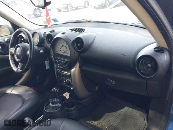 2014 MINI Countryman with VIN WMWZB3C59EWR37439, listed as a IAAI auction lot 42110149 with 181,661 mi miles and . Bid and sale history available at DreamBid. Image 5.
