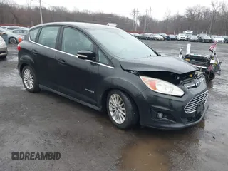 2014 Ford C-Max SEL z VIN 1FADP5BU7EL504518, wystawiony jako IAAI lot #41715611 z przebiegiem 132 277 mil mil oraz . Historia ofert i sprzedaży dostępna na DreamBid. Obrazek 1.