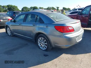 2010 Chrysler Sebring Limited with VIN 1C3CC5FD6AN190813, listed as a IAAI auction lot 42228345 with 113,512 mi miles and . Bid and sale history available at DreamBid. Image 3.