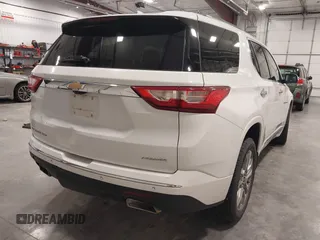 2021 Chevrolet Traverse Premier with VIN 1GNEVKKW7MJ218772, listed as a IAAI auction lot 42306743 with 106,898 mi miles and . Bid and sale history available at DreamBid. Image 4.