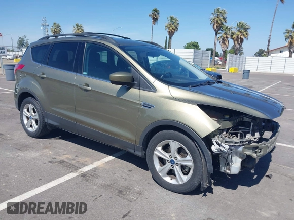 2013 Ford Escape SE with VIN 1FMCU0G99DUC05901, listed as a IAAI auction lot 42194672 with 121,435 mi miles and . Bid and sale history available at DreamBid. Image 1.