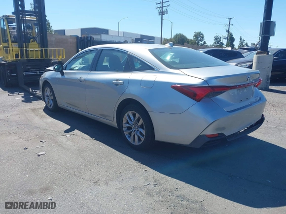 2019 Toyota Avalon Hybrid Limited with VIN 4T1B21FB1KU003112, listed as a IAAI auction lot 41610307 with 169,569 mi miles. Bid and sale history available at carsss.com. Image 3.