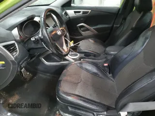 2012 Hyundai Veloster w/Gray Int с VIN KMHTC6AD1CU059480, выставлен на аукционе Copart как лот 86882034 с пробегом 146 464 миль миль и Чистый • Clean title. История ставок и продаж доступна на DreamBid. Изображение 7.