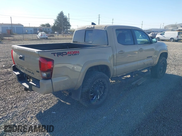 2018 Toyota Tacoma SR z VIN 3TMCZ5AN7JM125425, wystawiony jako IAAI lot #40459066 z przebiegiem 85 182 mil mil oraz . Historia ofert i sprzedaży dostępna na DreamBid. Obrazek 4.