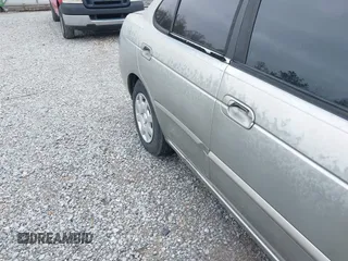 2002 Nissan Sentra GXE z VIN 3N1CB51D32L610845, wystawiony jako IAAI lot #41897848 z przebiegiem 118 472 mil mil oraz . Historia ofert i sprzedaży dostępna na DreamBid. Obrazek 6.