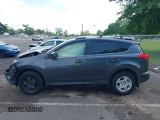 2015 Toyota RAV4 LE with VIN JTMBFREV4FD165163, listed as a IAAI auction lot 42638608 with 188,083 mi miles and . Bid and sale history available at DreamBid. Image 14.