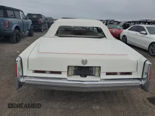1974 Cadillac Eldorado z VIN 6L67S4Q408046, wystawiony jako Copart lot #77112024 z przebiegiem 97 414 mil mil oraz Szkoda całkowita • Salvage title. Historia ofert i sprzedaży dostępna na DreamBid. Obrazek 6.
