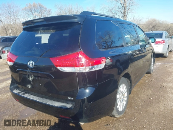 2011 Toyota Sienna XLE AAS with VIN 5TDYK3DC0BS030313, listed as a IAAI auction lot 41783766 with 267,937 mi miles. Bid and sale history available at carsss.com. Image 4.