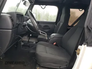 2006 Jeep Wrangler X z VIN 1J4FA39S56P742837, wystawiony jako Copart lot #58166415 z przebiegiem 97 224 mil mil oraz Szkoda całkowita • Salvage title. Historia ofert i sprzedaży dostępna na DreamBid. Obrazek 7.