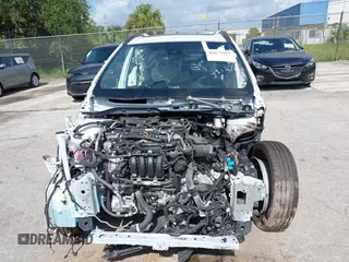 2022 Toyota Corolla Cross LE with VIN 7MUBAAAG9NV012455, listed as a IAAI auction lot 42671891 with Not provided miles and . Bid and sale history available at DreamBid. Image 6.