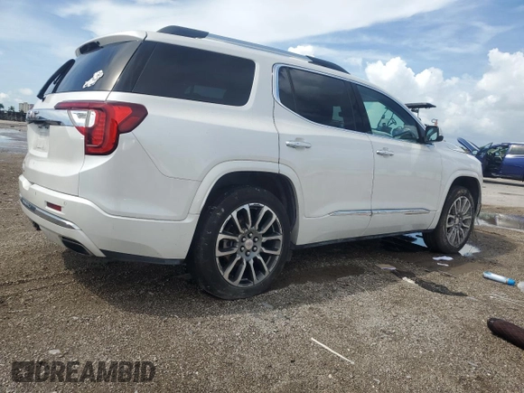 2022 GMC Acadia Denali with VIN 1GKKNPLS9NZ154553, listed as a Copart auction lot 69231444 with 105,997 mi miles and Salvage Title. Bid and sale history available at carsss.com. Image 3.
