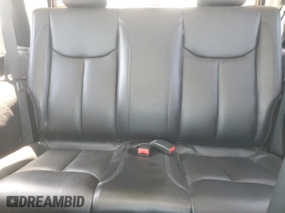 2013 Jeep Wrangler Sahara with VIN 1C4AJWBG8DL602065, listed as a Copart auction lot 52082535 with 110,727 mi miles and Salvage title. Bid and sale history available at DreamBid. Image 10.