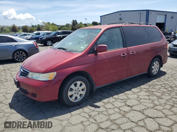 2004 Honda Odyssey EX-L with VIN 5FNRL18014B031578, listed as a Copart auction lot 56938795 with 241,085 mi miles and Salvage title. Bid and sale history available at DreamBid. Image 1.