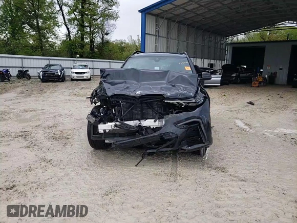 2020 BMW X7 M50i z VIN 5UXCX6C06LLE35455, wystawiony jako Copart lot #54965075 z przebiegiem Nie podano mil oraz Szkoda całkowita • Salvage title. Historia ofert i sprzedaży dostępna na DreamBid. Obrazek 14.