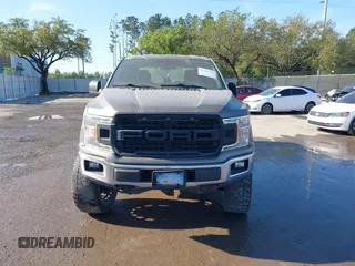 2018 Ford F-150 XL with VIN 1FTEW1EG1JFC31794, listed as a IAAI auction lot 41304111 with 129,058 mi miles and . Bid and sale history available at carsss.com. Image 12.