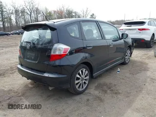 2013 Honda Fit Sport with VIN JHMGE8H59DC046377, listed as a IAAI auction lot 41921693 with 89,704 mi miles. Bid and sale history available at carsss.com. Image 4.