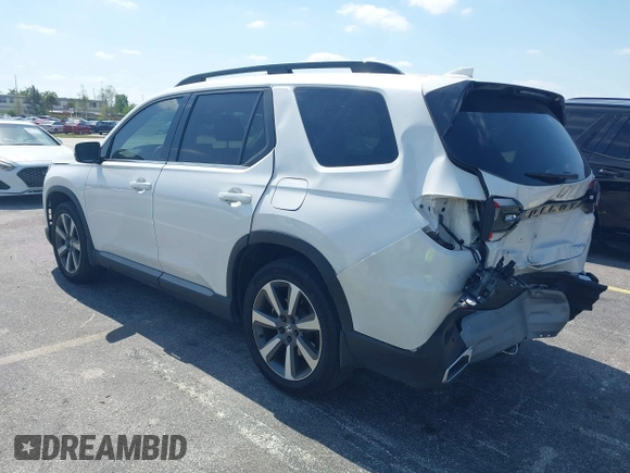 2024 Honda Pilot Touring z VIN 5FNYG2H72RB016937, wystawiony jako IAAI lot #42137854 z przebiegiem 18 028 mil mil oraz . Historia ofert i sprzedaży dostępna na DreamBid. Obrazek 3.