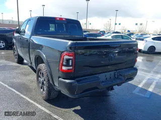 2022 Ram 2500 Laramie with VIN 3C6UR5FL2NG377414, listed as a IAAI auction lot 41492443 with 100,477 mi miles. Bid and sale history available at carsss.com. Image 3.