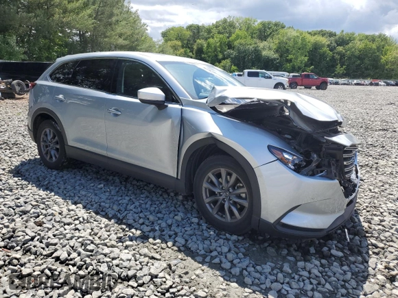 2022 Mazda CX-9 Touring z VIN JM3TCBCY6N0618360, wystawiony jako Copart lot #58356635 z przebiegiem 36 606 mil mil oraz Szkoda całkowita • Salvage title. Historia ofert i sprzedaży dostępna na DreamBid. Obrazek 4.