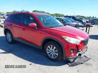 2015 Mazda CX-5 Touring with VIN JM3KE2CY5F0542184, listed as a IAAI auction lot 41770264 with 119,592 mi miles. Bid and sale history available at carsss.com. Image 1.