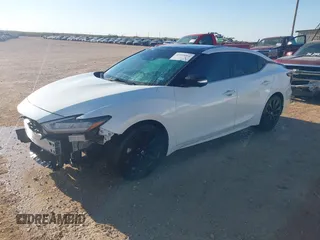 2020 Nissan Maxima SR with VIN 1N4AA6EVXLC365710, listed as a IAAI auction lot 40969464 with 74,320 mi miles and . Bid and sale history available at DreamBid. Image 18.