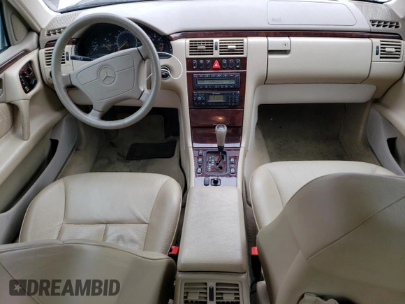 1999 Mercedes-Benz E-Class with VIN WDBJF82H2XX015586, listed as a Copart auction lot 44465455 with 76,890 mi miles and Salvage Title. Bid and sale history available at carsss.com. Image 8.
