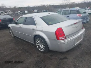 2009 Chrysler 300 with VIN 2C3LA63T89H622085, listed as a IAAI auction lot 41872519 with 151,543 mi miles. Bid and sale history available at carsss.com. Image 3.