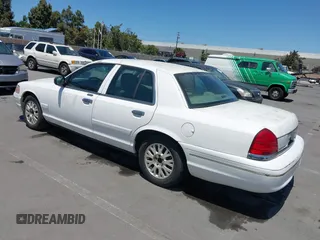 2004 Ford Crown Victoria LX z VIN 2FAFP74W34X170637, wystawiony jako IAAI lot #42478531 z przebiegiem 168 885 mil mil oraz . Historia ofert i sprzedaży dostępna na DreamBid. Obrazek 3.