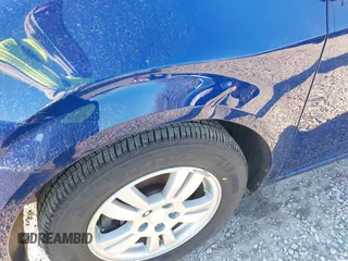 2014 Chevrolet Sonic LT with VIN 1G1JC5SH6E4164809, listed as a IAAI auction lot 42006407 with 105,710 mi miles and . Bid and sale history available at DreamBid. Image 6.