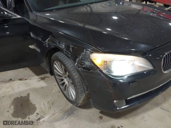 2012 BMW 7 Series 750Li xDrive with VIN WBAKC8C57CC435569, listed as a IAAI auction lot 41813222 with 139,751 mi miles. Bid and sale history available at carsss.com. Image 6.