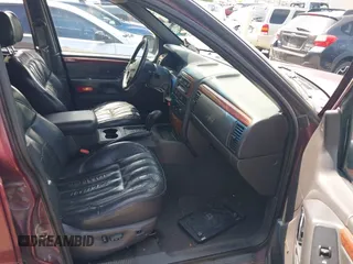 1999 Jeep Grand Cherokee Limited with VIN 1J4GW68S9XC653855, listed as a IAAI auction lot 42433370 with 275,724 mi miles and . Bid and sale history available at DreamBid. Image 5.