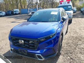 2023 Honda CR-V Sport Touring with VIN 5J6RS6H96PL001826, listed as a IAAI auction lot 42098381 with 13,813 mi miles and . Bid and sale history available at DreamBid. Image 12.