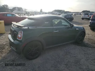 2013 MINI Coupe S z VIN WMWSX3C51DT409008, wystawiony jako Copart lot #82781914 z przebiegiem 122 465 mil mil oraz Tytuł czysty. Historia ofert i sprzedaży dostępna na DreamBid. Obrazek 3.