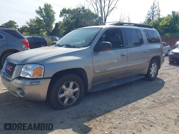 2003 GMC Envoy SLT with VIN 1GKES16S336101568, listed as a IAAI auction lot 40187998 with 185,402 mi miles. Bid and sale history available at carsss.com. Image 2.