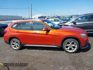 2015 BMW X1 xDrive28i with VIN WBAVL1C57FVY27822, listed as a IAAI auction lot 41977545 with 76,211 mi miles. Bid and sale history available at carsss.com. Image 13.