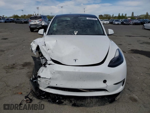 2022 Tesla Model Y Performance с VIN 7SAYGDEF2NF405596, выставлен на аукционе Copart как лот 52868195 с пробегом Не указан миль и Списание • Salvage title. История ставок и продаж доступна на DreamBid. Изображение 5.