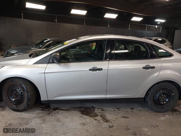 2016 Ford Focus S with VIN 1FADP3E22GL390039, listed as a IAAI auction lot 41958137 with 83,411 mi miles. Bid and sale history available at carsss.com. Image 14.