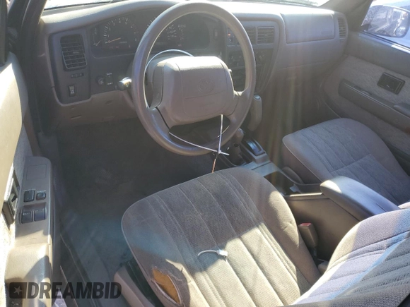1998 Toyota Tacoma with VIN 4TAWN72N6WZ106014, listed as a Copart auction lot 87767435 with 167,626 mi miles and Salvage Title. Bid and sale history available at DreamBid. Image 8.