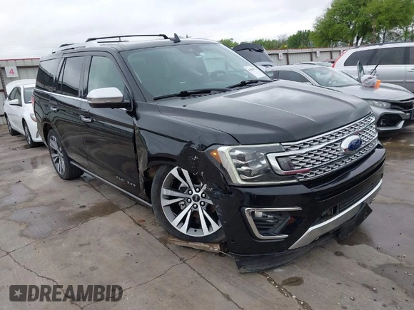 2019 Ford Expedition Platinum with VIN 1FMJU1MT8KEA02325, listed as a IAAI auction lot 41861772 with 77,124 mi miles. Bid and sale history available at carsss.com. Image 1.
