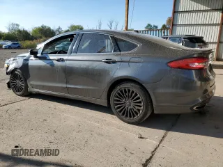 2018 Ford Fusion Titanium с VIN 3FA6P0D92JR192382, выставлен на аукционе Copart как лот 74065774 с пробегом 110 411 миль миль и Списание • Salvage title. История ставок и продаж доступна на DreamBid. Изображение 2.