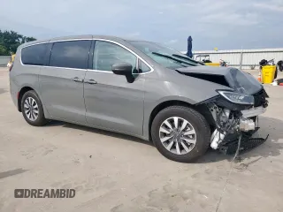 2023 Chrysler Pacifica Hybrid Touring L with VIN 2C4RC1L72PR614075, listed as a Copart auction lot 58586115 with 43,960 mi miles and Salvage title. Bid and sale history available at DreamBid. Image 4.