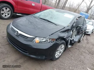 2012 Honda Civic Sdn LX with VIN 19XFB2F51CE070864, listed as a IAAI auction lot 41575487 with 184,281 mi miles. Bid and sale history available at carsss.com. Image 2.