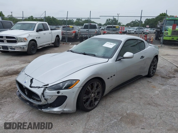 2013 Maserati GranTurismo Sport with VIN ZAM45VLA8D0072490, listed as a IAAI auction lot 42438872 with 84,214 mi miles and . Bid and sale history available at DreamBid. Image 2.