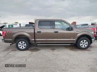 2015 Ford F-150 XLT with VIN 1FTEW1EP1FKE71345, listed as a IAAI auction lot 41946214 with 314,016 mi miles and . Bid and sale history available at DreamBid. Image 13.